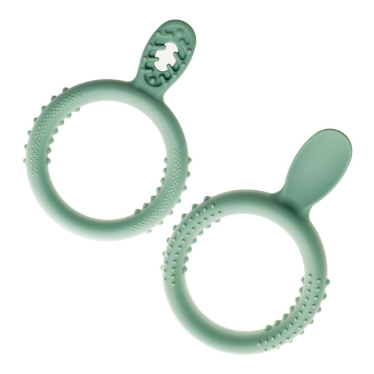 Two TalkTools Itsy Rings self-feeding spoons in mint green silicone