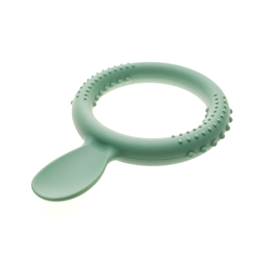 TalkTools Itsy Rings in soft green silicone, showing the textured ring handle