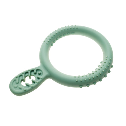 Close view of the textured surface of a TalkTools Itsy Ring spoon
